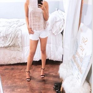 Fashion forward sleeveless keyhole top Nude color